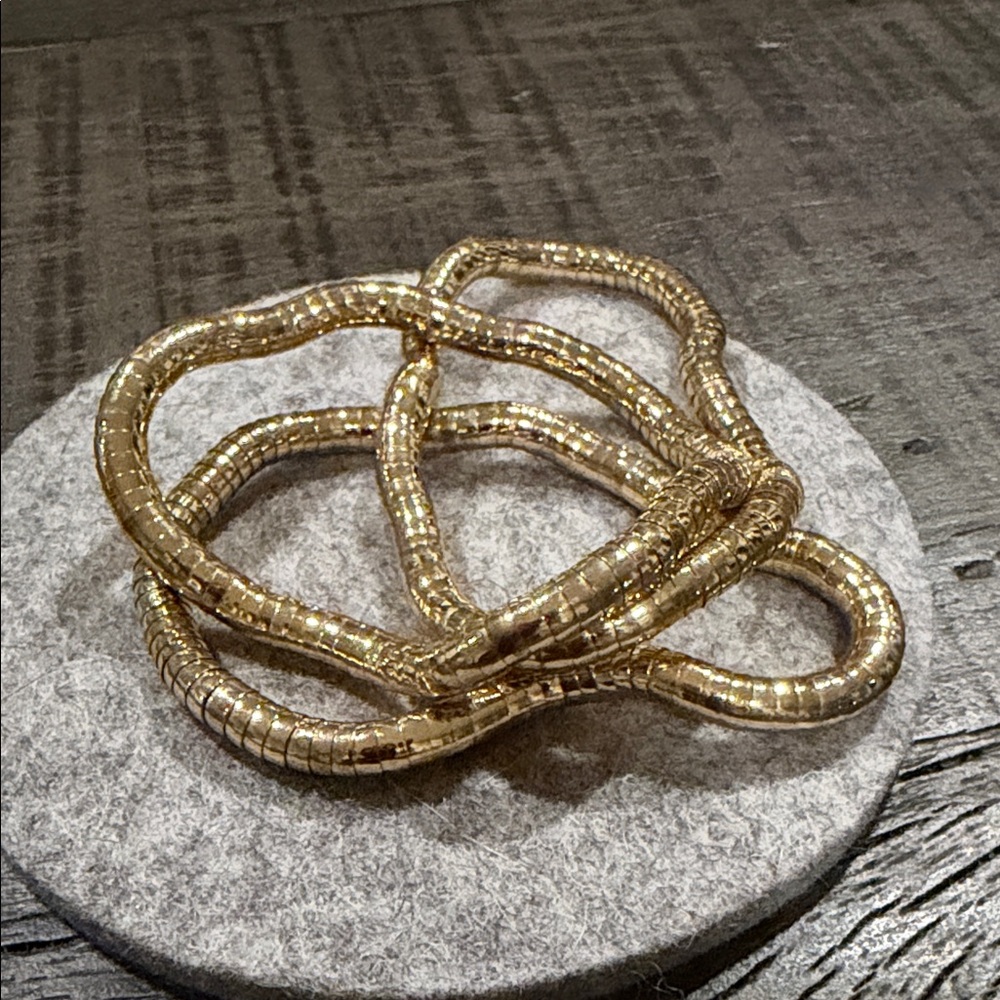 Set of Three Gold bracelets